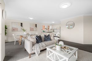 Bright open-plan living and dining area with kitchen at 17/67 Woniora Road, Hurstville