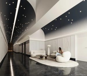 Architect-designed apartment lobby with sculptural seating, feature lighting, and polished stone flooring at a1208/499 Botany Road, Zetland NSW