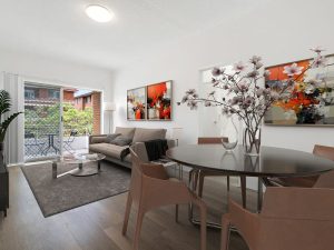 Modern open-plan living and dining area with balcony access at 12/67 Warialda Street, Kogarah NSW 2217