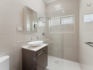Modern bathroom with vessel basin and frameless walk-in shower – 101 Hillcrest Ave, HURSTVILLE GROVE NSW 2220 | Noonan Real Estate