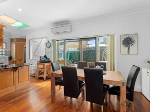 Dining area with timber floors opening to the rear courtyard – 101 Hillcrest Ave, HURSTVILLE GROVE NSW 2220 | Noonan Real Estate